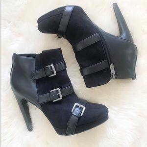 Black heel bootie with buckle detail